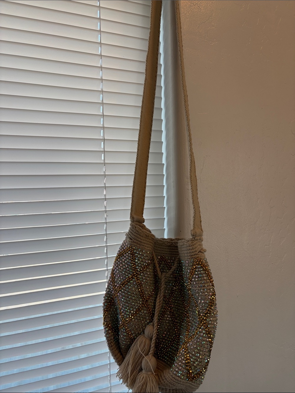 Handcrafted Beige Beaded Bucket Bag with Tassels